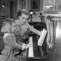 a piano teacher and a student
